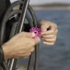Junta tórica para varillas de pesca submarina. Sujetan la aletilla o muerte. Ayudan a apuntar. Marca One Shot. Immersvs. Color rosa flúor, amarillo flúor y blanco.